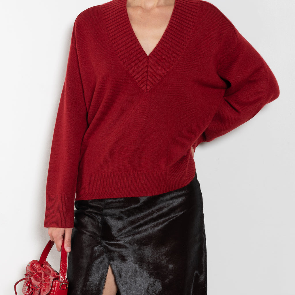 The Sage Sweater by Loulou Studio is an oversized sweater with an ample fit, a deep V, dropped shoulders and ribbed details in a thicker cashmere
