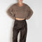 The Sbiru Pants by Loulou Studio are signature suiting paints that sit on the waist, are ample and pleated at the waist