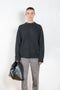 The Baltra Sweater by Loulou Studio is a cashmere sweater with an ample fit and ribbed trims