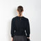 The Mora Sweater by Loulou Studio is a&nbsp;high round neck sweater with side slits and cropped sleeves