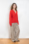 The Sage Sweater by Loulou Studio is an oversized sweater with an ample fit, a deep V, dropped shoulders and ribbed details
