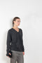 The Serafini Vneck by Loulou Studio is a loose V neck sweater in a soft cashmere
