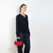 The Serafini Vneck by Loulou Studio is a loose V neck sweater in a soft cashmere