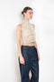 The Crochet Lace Top by Magda Butrym is a cropped top with a high neck and an all-over floral design in traditional Polish crochet technique