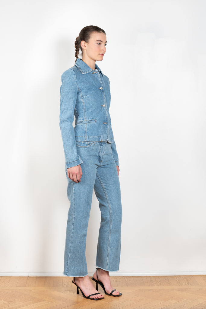 The Denim Blazer by Magda Butrym is a signature fitted denim jacket in a structured cotton with a peplum fit