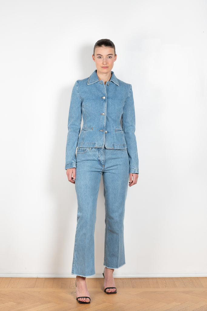 The Denim Blazer by Magda Butrym is a signature fitted denim jacket in a structured cotton with a peplum fit