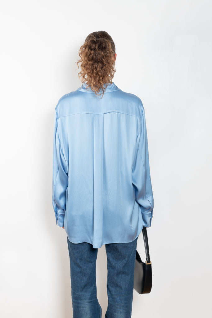 The Silk Shirt by Magda Butrym is a classic button down blouse done in silk with a flowy silhouette