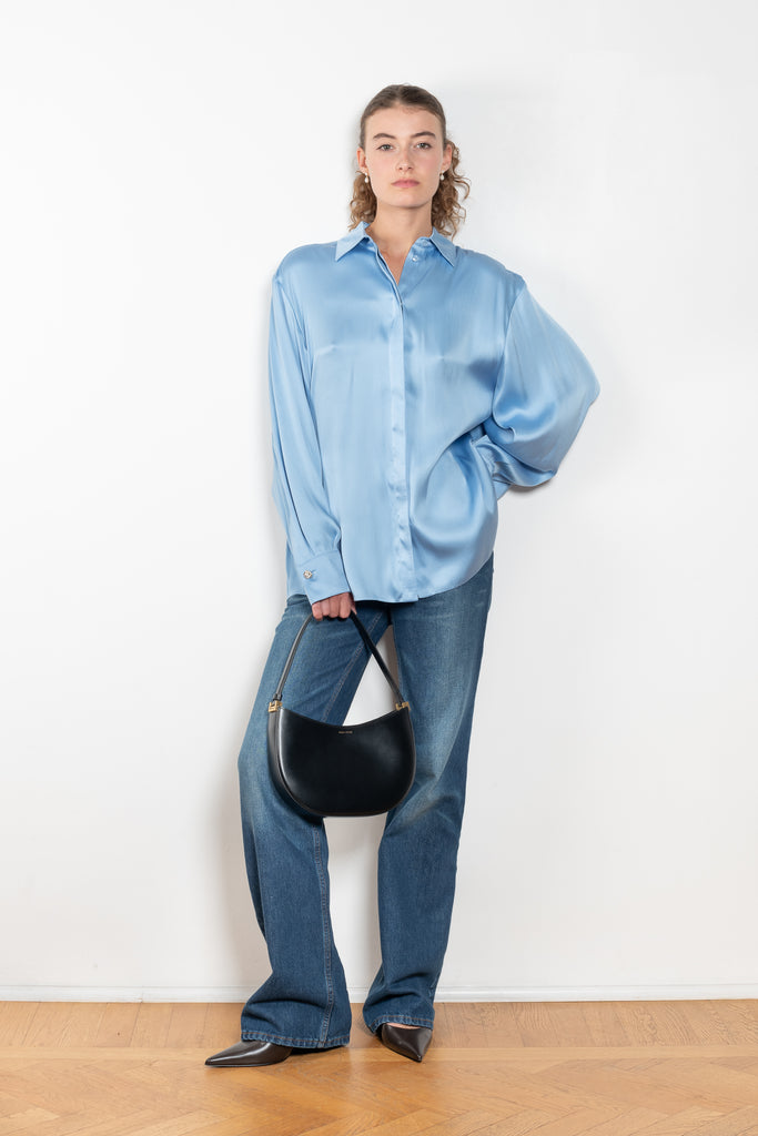 The Silk Shirt by Magda Butrym is a classic button down blouse done in silk with a flowy silhouette