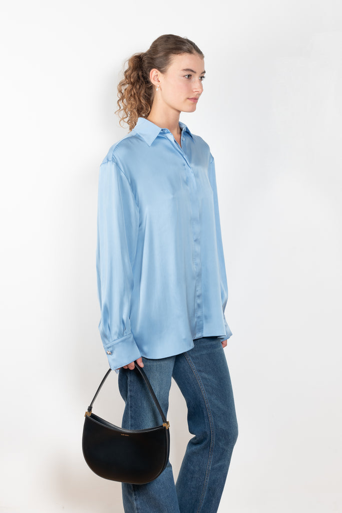 The Silk Shirt by Magda Butrym is a classic button down blouse done in silk with a flowy silhouette