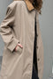 The Mac Coat by Meryll Rogge is an oversized cotton coat with an exaggerated shoulder line and a corduroy collar
