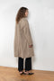 The Mac Coat by Meryll Rogge is an oversized cotton coat with an exaggerated shoulder line and a corduroy collar