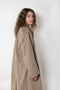 The Mac Coat by Meryll Rogge is an oversized cotton coat with an exaggerated shoulder line and a corduroy collar