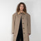 The Mac Coat by Meryll Rogge is an oversized cotton coat with an exaggerated shoulder line and a corduroy collar