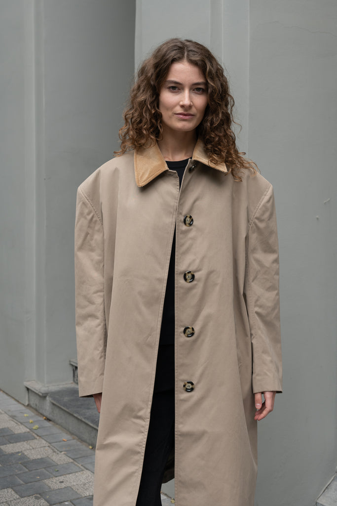 The Mac Coat by Meryll Rogge is an oversized cotton coat with an exaggerated shoulder line and a corduroy collar