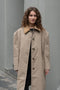 The Mac Coat by Meryll Rogge is an oversized cotton coat with an exaggerated shoulder line and a corduroy collar
