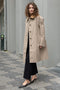 The Mac Coat by Meryll Rogge is an oversized cotton coat with an exaggerated shoulder line and a corduroy collar