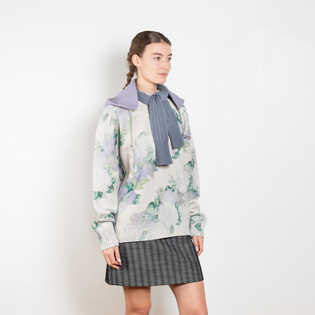 The Oversized Sweatshirt by Meryll Rogge is a seasonal sweater with a round neck and ribbed trims in a faded meadow floral print