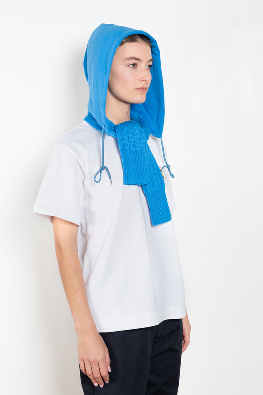 The Hood with Scarf by Meryll Rogge is a signature accessory, a wool scarf with a jersey hood all in one