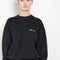 The Oversized Sweatshirt by Meryll Rogge is a signature sweatshirt with a round neck and ribbed trims