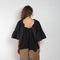 The Ruffled Back Drape Top by Meryll Rogge is a crisp cotton top with an open back and a back draped detail