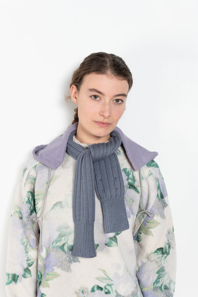 The Hood with Scarf by Meryll Rogge is a signature accessory, a wool scarf with a jersey hood all in one