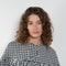The Short Ruffle Dress by Meryll Rogge is a short dress with a vichy print and cute ruffles