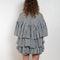 The Short Ruffle Dress by Meryll Rogge is a short dress with a vichy print and cute ruffles