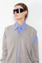 The Slim Fit Shirt by Meryll Rogge is an fitted shirt with a tie detail at the collar in a beautiful lilac cotton