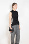 The Tuxedo Top by Meryll Rogge is structured sleeveless top with button detailing on the back and a tuxed band