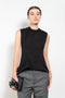 The Tuxedo Top by Meryll Rogge is structured sleeveless top with button detailing on the back and a tuxed band