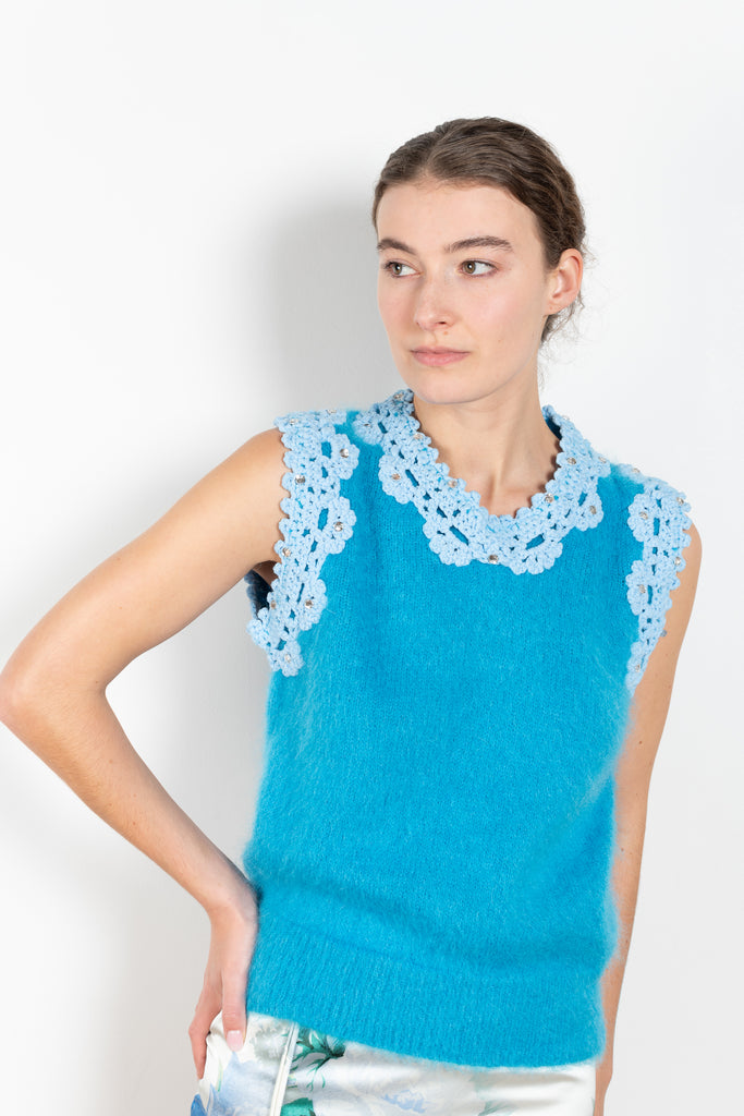 The Crochet Vest by Meryll Rogge is a showstopping runway piece, a sleeveless vest in a blue mohair with embellished crochet details