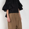 The Workwear Chino by Meryll Rogge is a signature oversized trouser with a drawstring closure