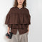 The Ruffle Tiered Top by Meryll Rogge is a crisp cotton top with layered ruffles that can be tucked into your trousers