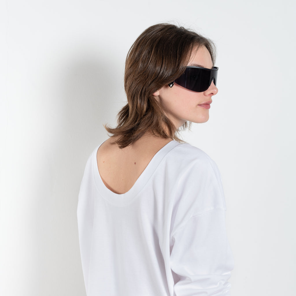 The TShirt 1990 by Monique Van Heist is a loose fitted lightweight sweat tshirt with a delicate open back detail