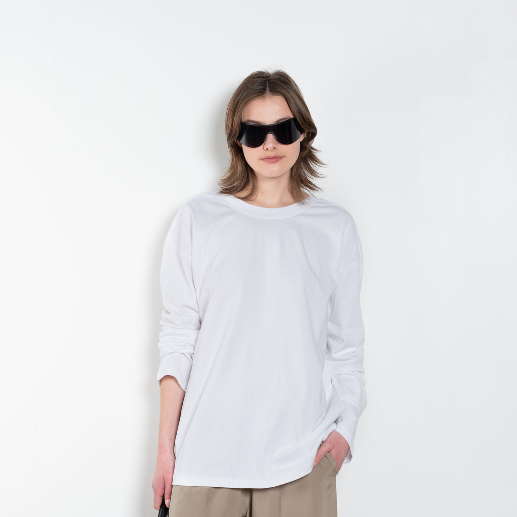 The TShirt 1990 by Monique Van Heist is a loose fitted lightweight sweat tshirt with a delicate open back detail