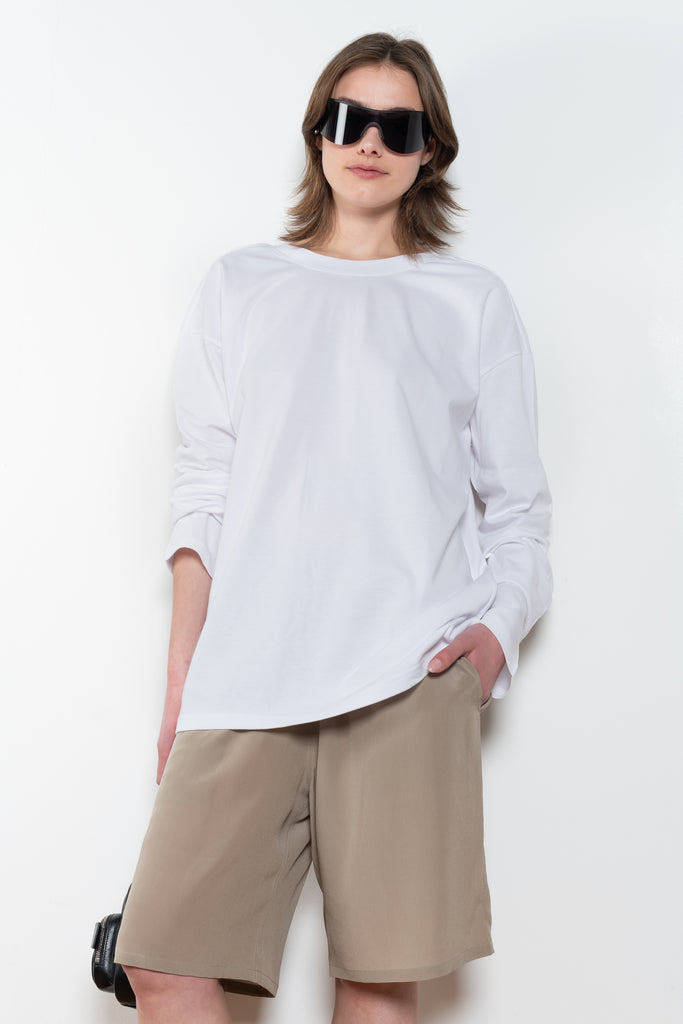 The TShirt 1990 by Monique Van Heist is a loose fitted lightweight sweat tshirt with a delicate open back detail