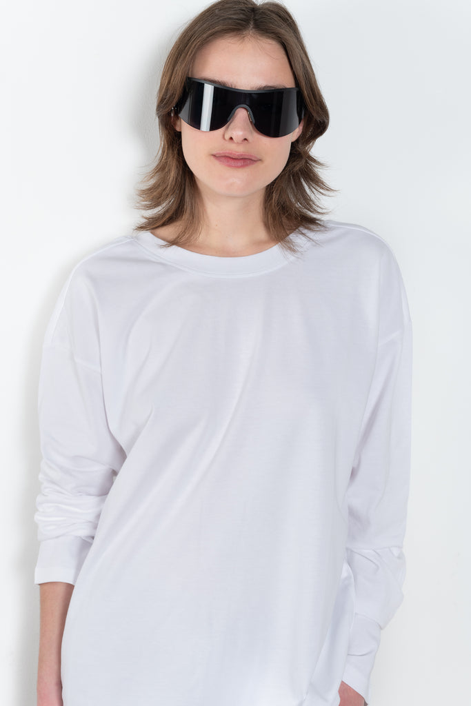 The TShirt 1990 by Monique Van Heist is a loose fitted lightweight sweat tshirt with a delicate open back detail