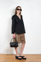 The V Shirt by Monique Van Heist is a loose fitted shirt with baseball inspired details