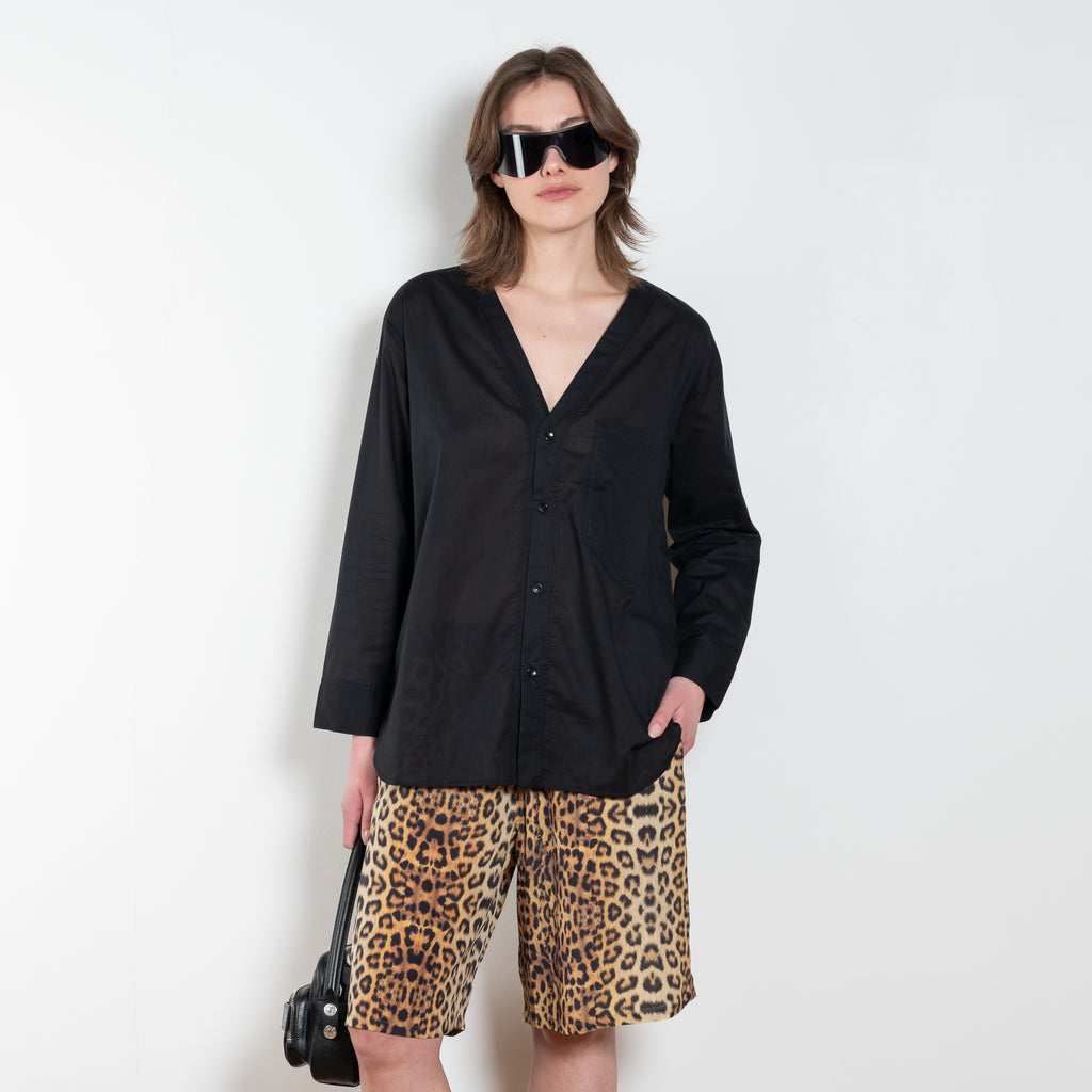 The V Shirt by Monique Van Heist is a loose fitted shirt with baseball inspired details