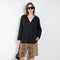 The V Shirt by Monique Van Heist is a loose fitted shirt with baseball inspired details