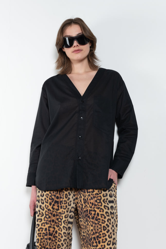The V Shirt by Monique Van Heist is a loose fitted shirt with baseball inspired details