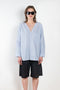 The V Shirt by Monique Van Heist is a loose fitted shirt with baseball inspired details