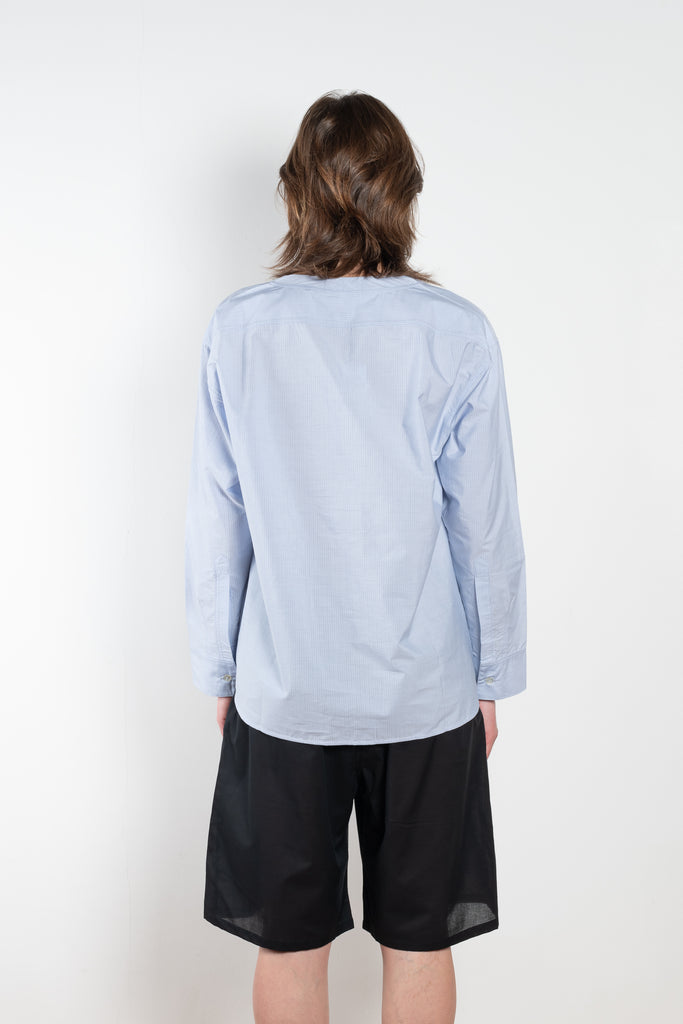 The V Shirt by Monique Van Heist is a loose fitted shirt with baseball inspired details