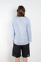 The V Shirt by Monique Van Heist is a loose fitted shirt with baseball inspired details