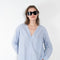 The V Shirt by Monique Van Heist is a loose fitted shirt with baseball inspired details