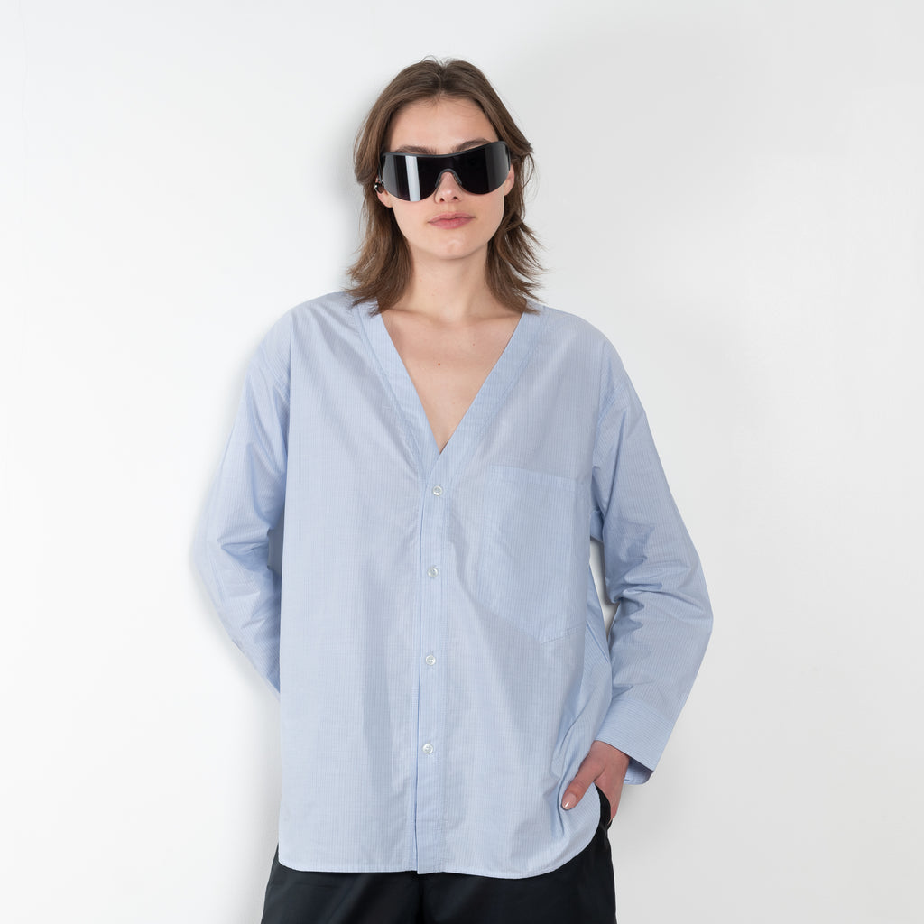 The V Shirt by Monique Van Heist is a loose fitted shirt with baseball inspired details