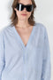 The V Shirt by Monique Van Heist is a loose fitted shirt with baseball inspired details