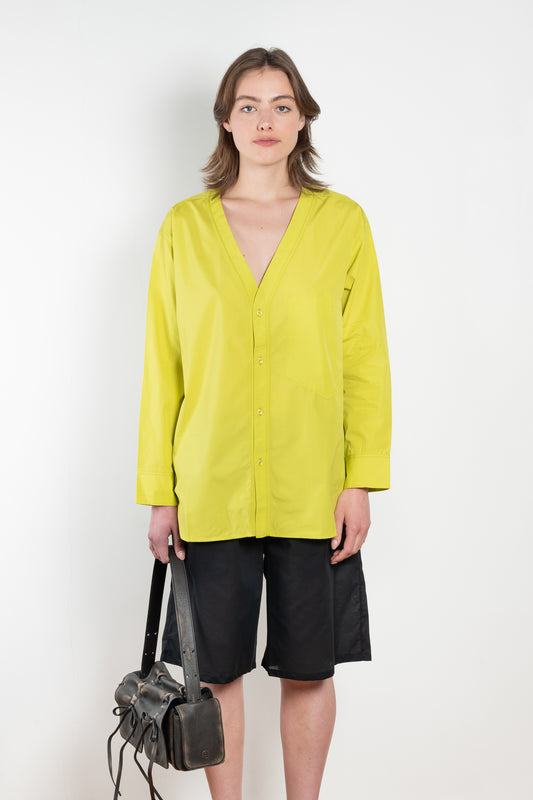 The V Shirt by Monique Van Heist is a loose fitted shirt with baseball inspired details