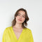 The V Shirt by Monique Van Heist is a loose fitted shirt with baseball inspired details