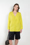 The V Shirt by Monique Van Heist is a loose fitted shirt with baseball inspired details